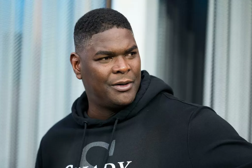 Former NFL player Keyshawn Johnson talks before an NFL football game between the Los Angeles Chargers and the New Orleans Saints in Inglewood, Calif., Sunday, Aug. 20, 2023.