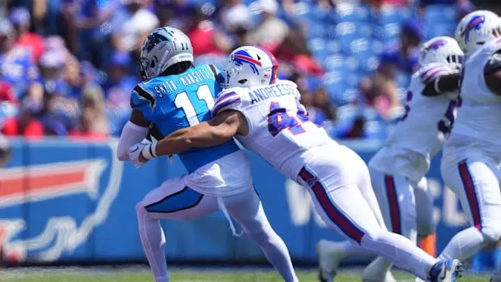 Aug 24, 2024; Orchard Park, New York, USA; Buffalo Bills linebacker Joe Andreessen (44) tackles Carolina Panthers wide receiver Ihmir Smith-Marsette (11)