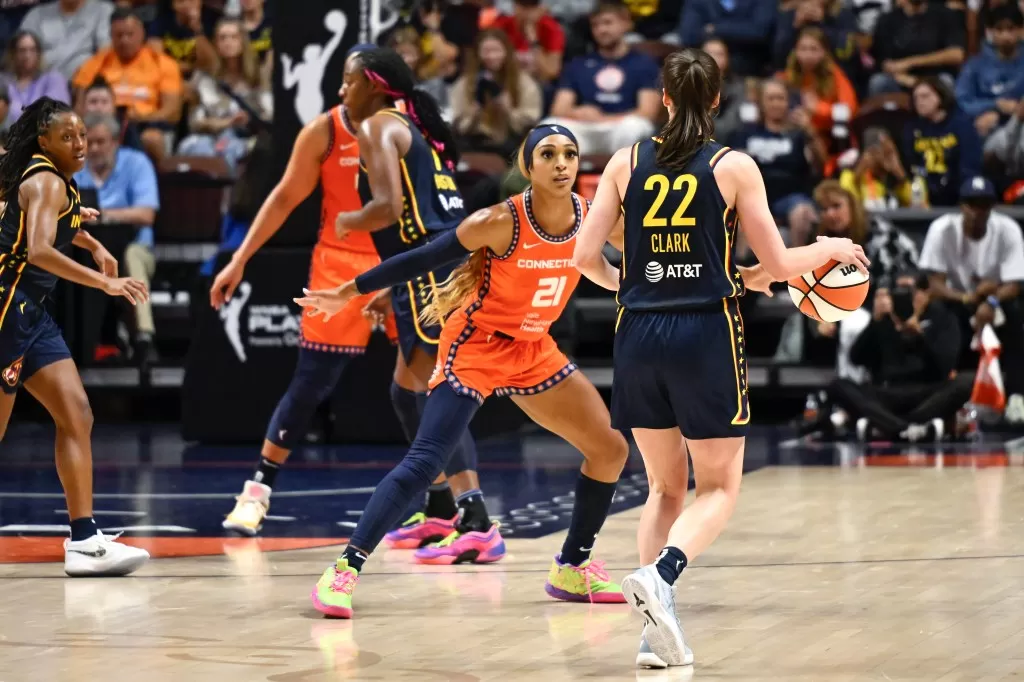 DiJonai Carrington plays defense on Caitlin Clark during Game 1 of the 2024 WNBA Playoffs. 