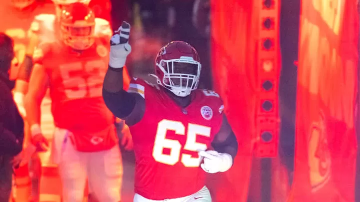 Jan 26, 2025; Kansas City, MO, USA; Kansas City Chiefs guard Trey Smith (65) against the Buffalo Bills in the AFC Championship game at GEHA Field at Arrowhead Stadium. Mandatory Credit: Mark J. Rebilas-Imagn Images