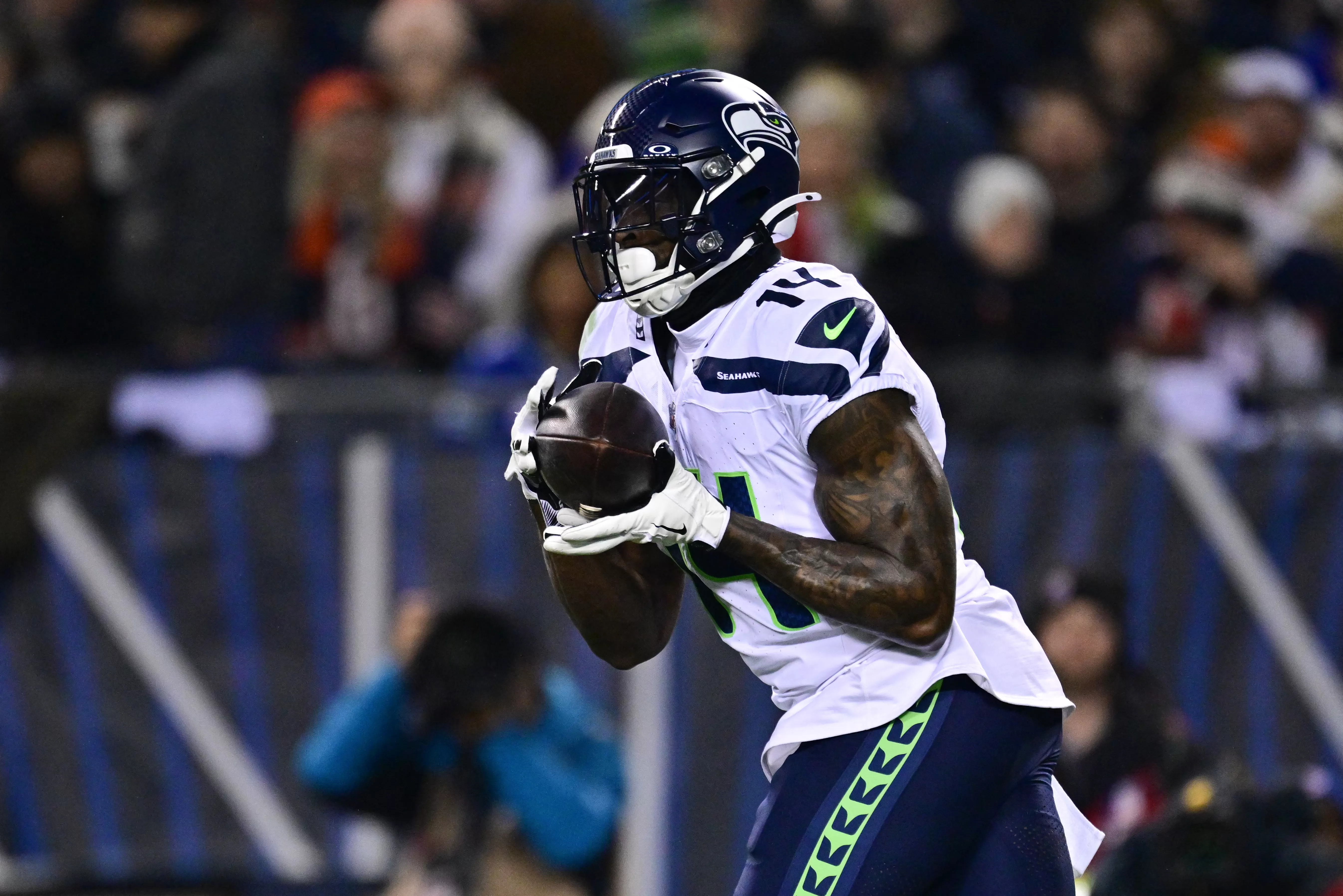 DK Metcalf of the Seattle Seahawks making a catch during a football game.