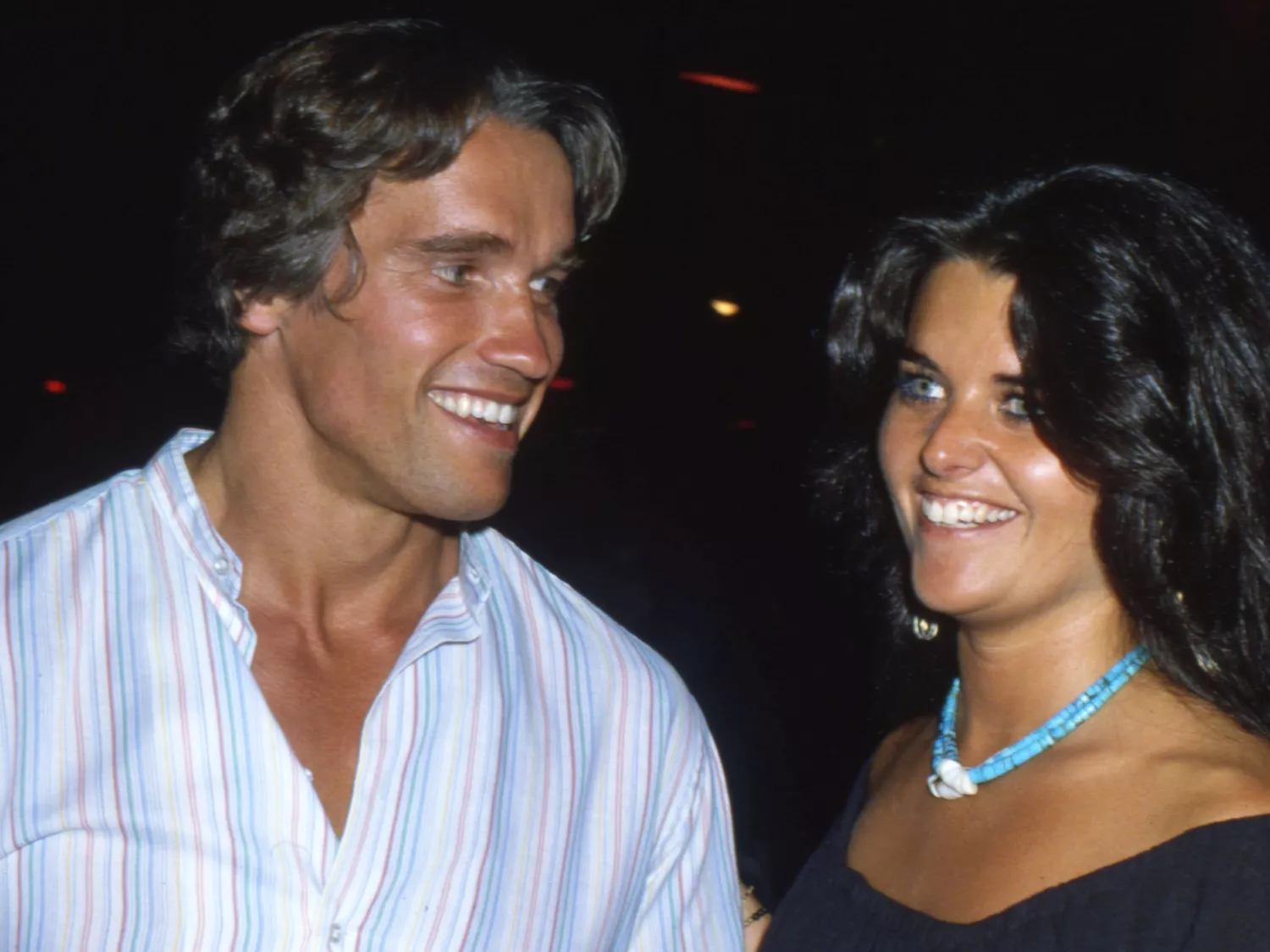 Arnold Schwarzenegger and future wife Maria Shriver collect donations for Senator Ted Kennedy's 1980 Presidential bid in June 1980 at Flippers Roller Disco in Los Angeles, California