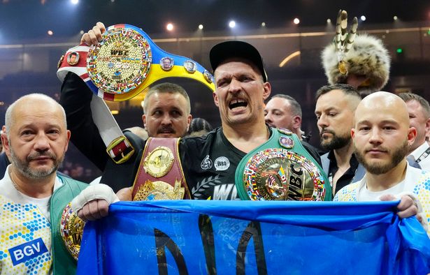 Oleksandr Usyk celebrates