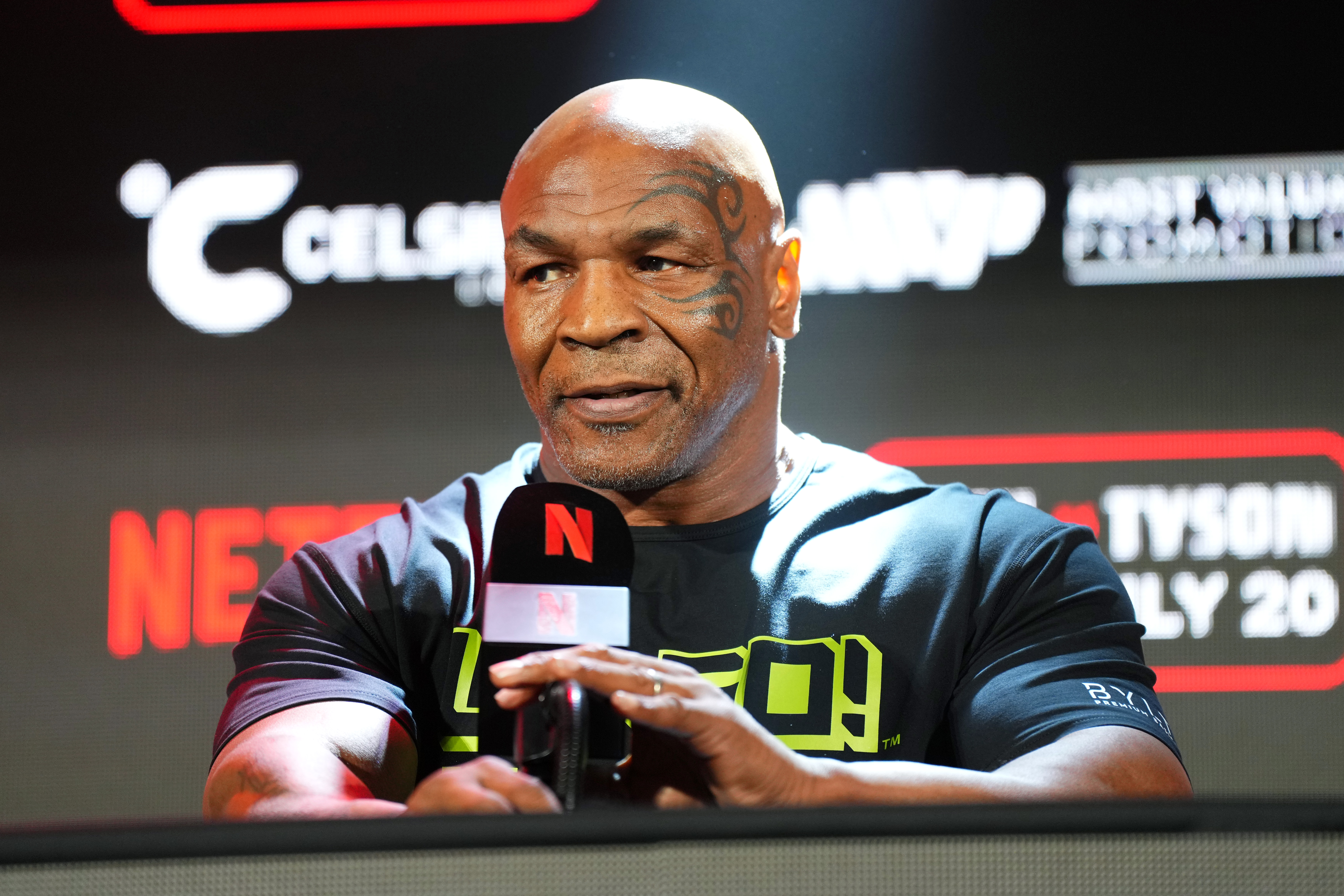 Mike Tyson speaks onstage during the Jake Paul vs. Mike Tyson Boxing match