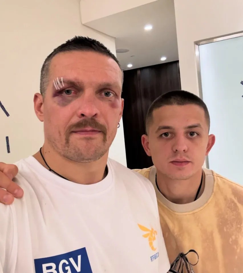 Usyk posing with Stepchuk after beating Tyson Fury