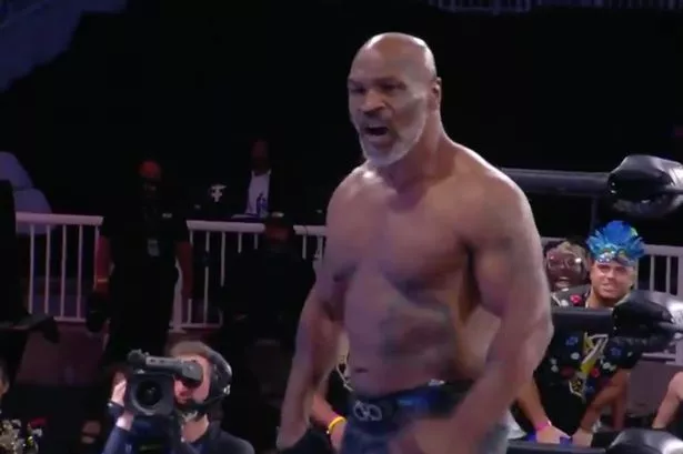 Mike Tyson shows off insane physique as he appears at AEW ahead of comeback  - Daily Star