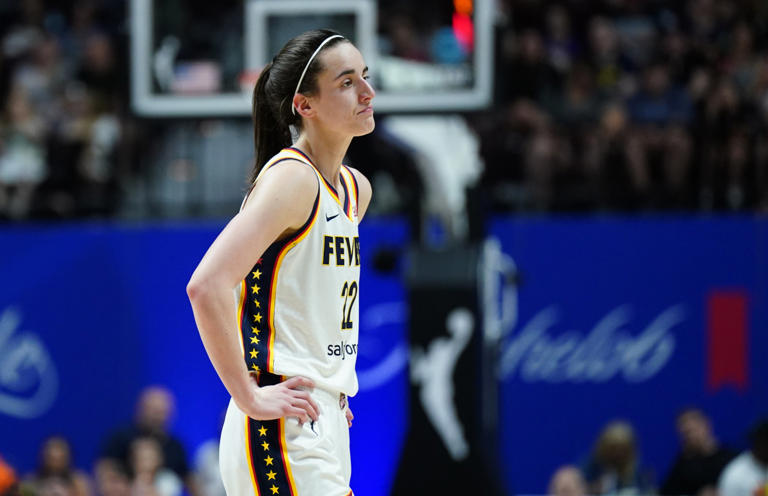 Jun 10, 2024; Uncasville, Connecticut, USA; Indiana Fever guard Caitlin Clark (22) reacts after her third foul against the Connecticut Sun in the second quarter at Mohegan Sun Arena. David Butler II-USA TODAY Sports