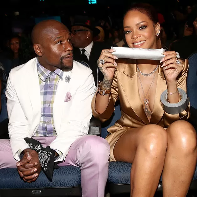 BET Awards 2015: Rihanna Throws Actual Money At Stephen Hill AND Duct Tapes  Floyd Mayweather's Mouth