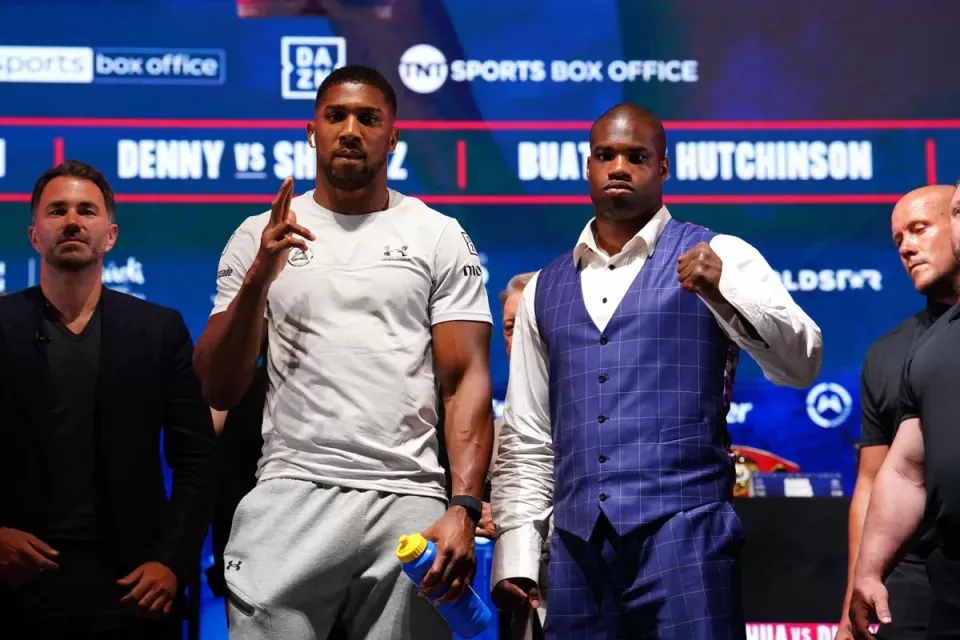 Anthony Joshua (centre-left) and Daniel Dubois are set to clash in September (Jordan Pettitt/PA)