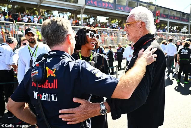 She was seen catching up with her former fiancé Flavio Briatore (right), who she was engaged to in the early 2000s as she also bumped into Christian Horner