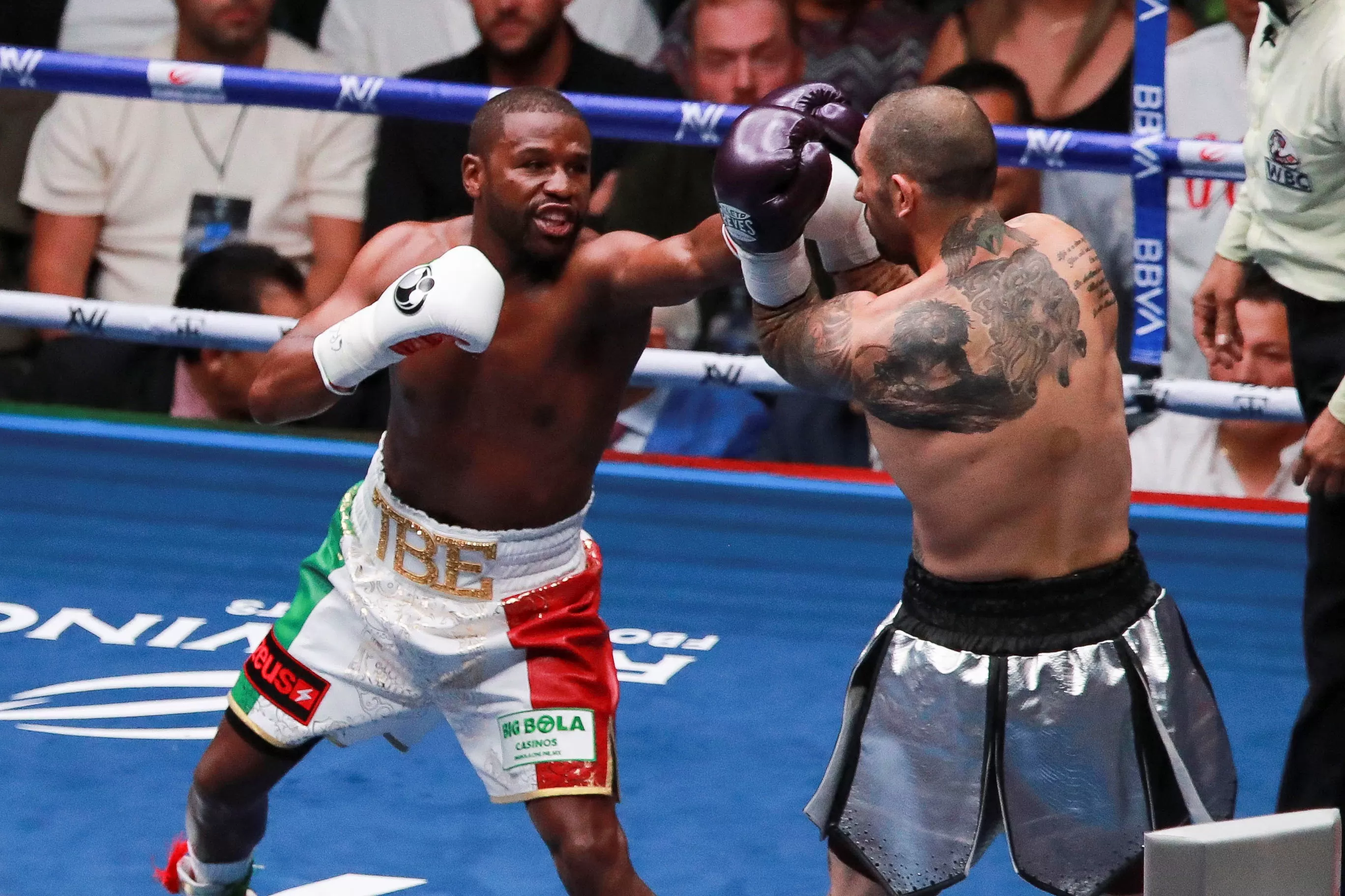 Fuming Floyd Mayweather appears to AXE referee mid-fight as he is swapped  out and John Gotti III bout ends in farce | The US Sun