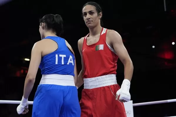 Algerian Imane Khelif wins first Olympic fight after Carini quits | AP News