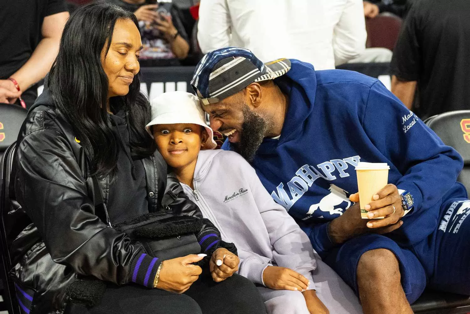 LeBron James Plays with Daughter While Courtside at Son's Basketball Game