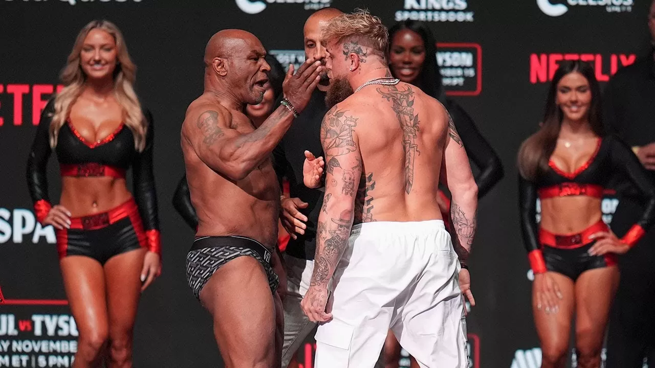 Mike Tyson slaps Jake Paul in face during weigh-in ahead of boxing match