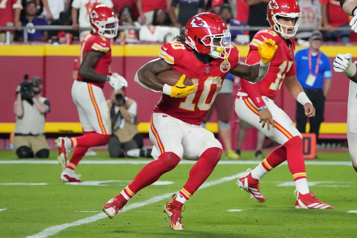 Kansas City Chiefs running back Isiah Pacheco (10) runs the ball against the Baltimore Ravens during the second half at GEHA Field at Arrowhead Stadium.