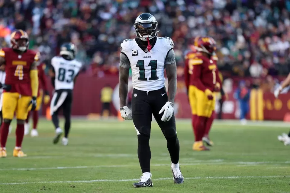 LANDOVER, MARYLAND - DECEMBER 22: A.J. Brown #11 of the Philadelphia Eagles celebrates a play against the Washington Commanders during the third quarter at Northwest Stadium on December 22, 2024 in Landover, Maryland. (Photo by Scott Taetsch/Getty Images)