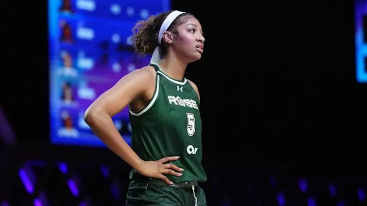 Jan 17, 2025; Miami, FL, USA; Angel Reese (5) of the Rose takes a moment against the Vinyl during a timeout in the first half of the Unrivaled women’s professional 3v3 basketball league at Wayfair Arena. Mandatory Credit: Jim Rassol-Imagn Images