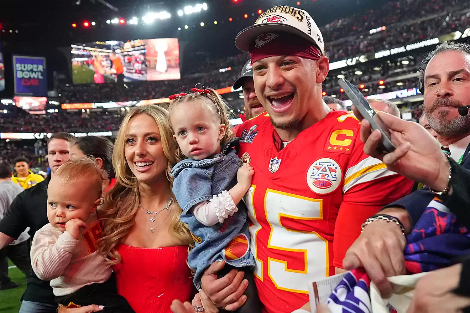  Super Bowl LVIII: Kansas City Chiefs Patrick Mahomes (15) poses with wife Brittany Mahomes and their children Patrick Bronze and Sterling Skye following victory vs San Francisco 49ers at Allegiant Stadium