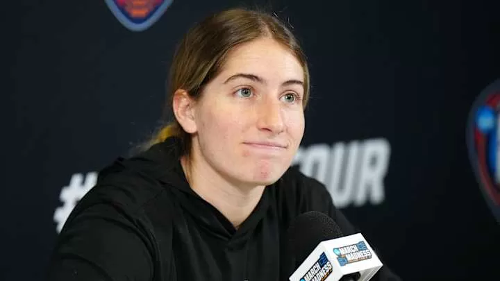 Apr 6, 2024; Cleveland, OH, USA; Iowa Hawkeyes guard Kate Martin speaks at press conference at Rocket Mortgage FieldHouse. Mandatory Credit: Kirby Lee-Imagn Images