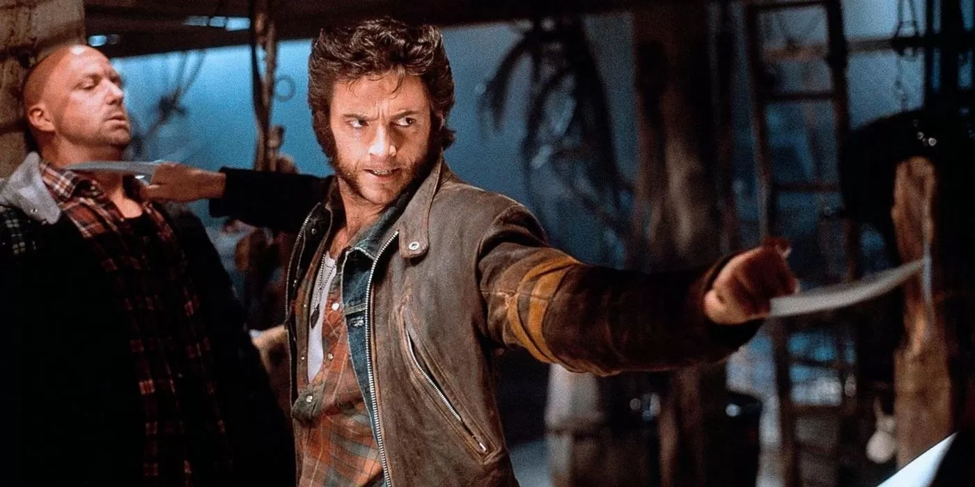 Hugh Jackman as Wolverine in X-Men (2000) holding out his claws