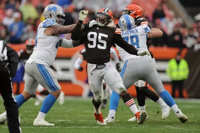 Cleveland Browns edge rusher Myles Garrett rushes against Detroit Lions tackle Taylor Decker at FirstEnergy Stadium on Nov. 21, 2021 in Cleveland, Ohio.