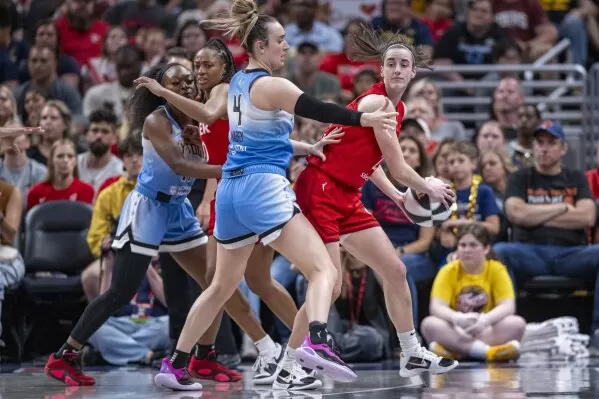 WNBA upgrades foul on Caitlin Clark by Chennedy Carter, fines Angel Reese for no postgame interview | AP News