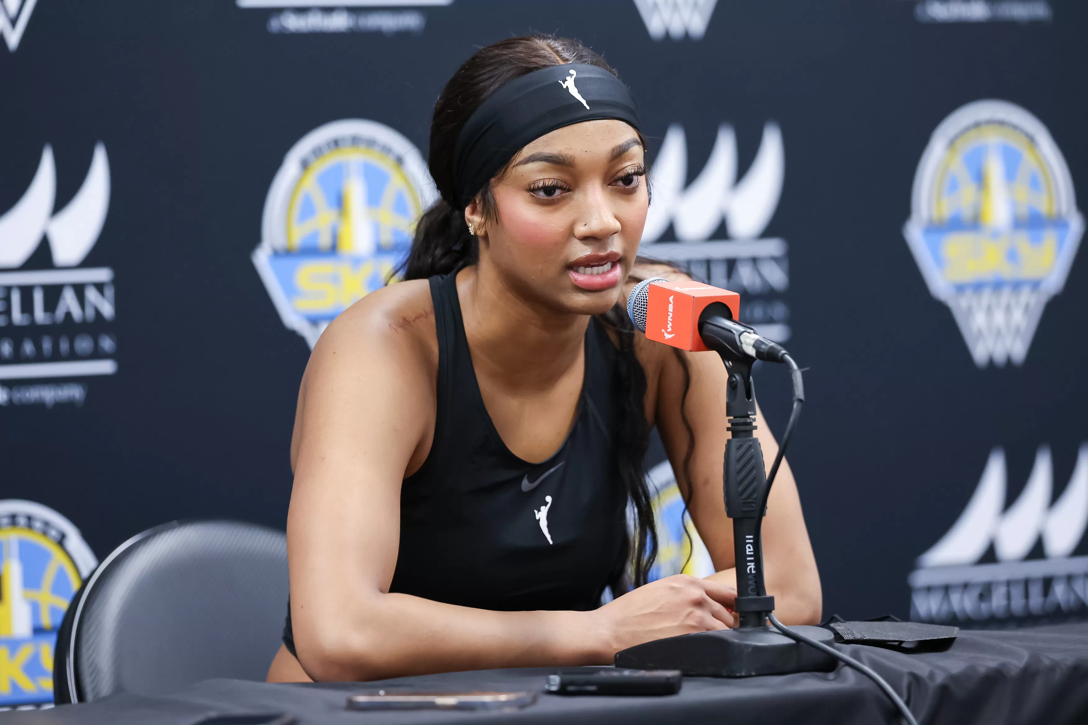 CHICAGO, ILLINOIS - AUGUST 30: Angel Reese #5 of the Chicago Sky talks to the media before the game against the Indiana Fever at Wintrust Arena on August 30, 2024 in Chicago, Illinois. NOTE TO USER: User expressly acknowledges and agrees that, by downloading and or using this photograph, User is consenting to the terms and conditions of the Getty Images License Agreement. (Photo by Michael Hickey/Getty Images)