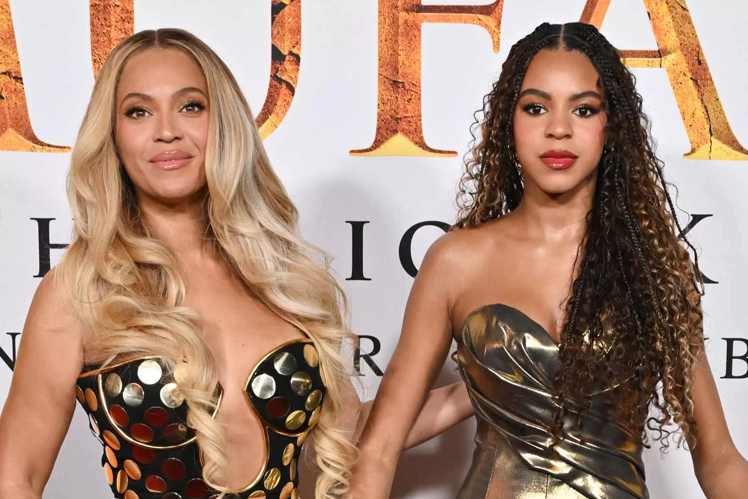 Beyoncé and Daughter Blue Ivy Match in Golden Gowns at 'Mufasa' L.A.  Premiere